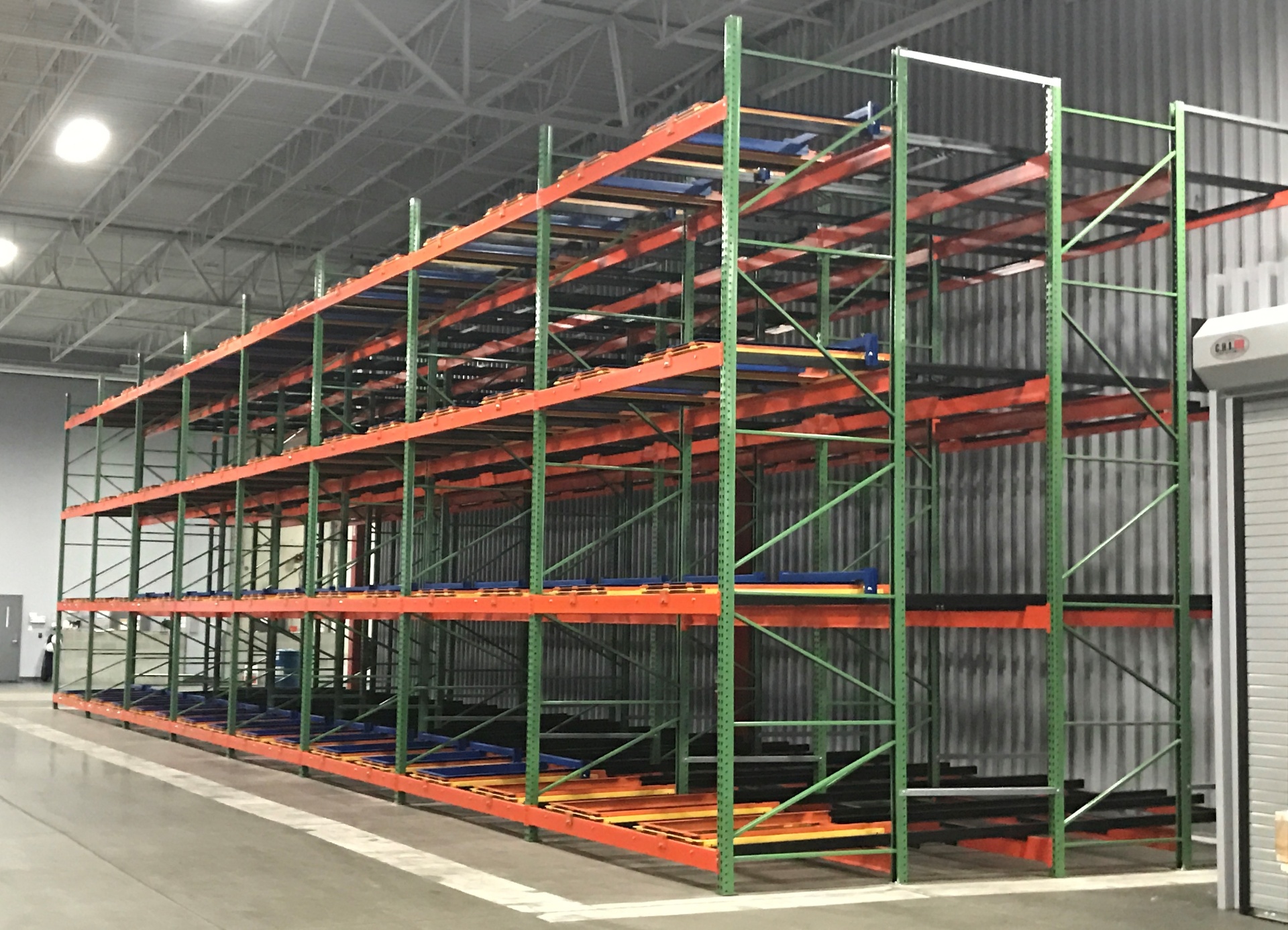 Pushback pallet racking for warehouse density